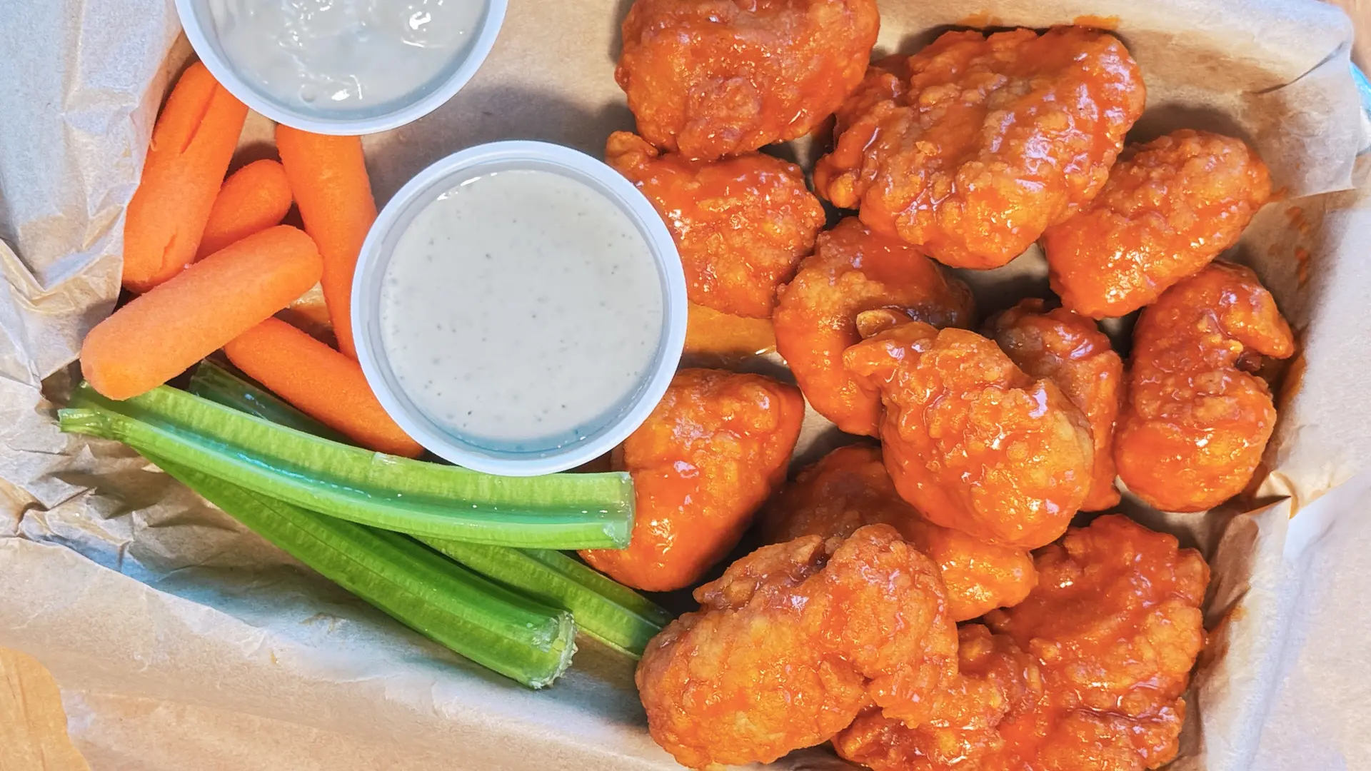 Grand Lake's best Boneless Buffalo Wings at Boom sports bar in Grove, OK