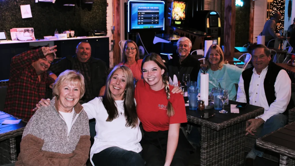 Patrons enjoying drinks and trivia night at Boom Sports Bar on Grand Lake in Grove, OK
